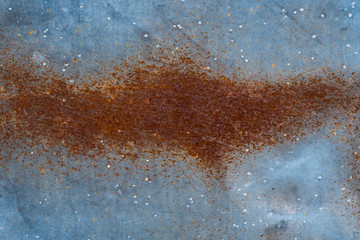 Steel blue plate There are orange rusty stained metal wall texture pattern .
