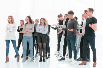groups of young men and women standing separately