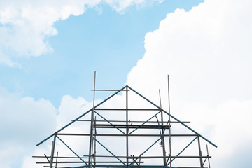 new house construction,new stick built home under construction under blue sky