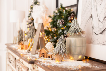 Nizhniy Novgorod, Russia - November 4, 2019: Photo studio 2.8. Lots of Christmas decorations standing on wooden desk. Selective focus