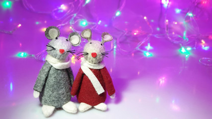 Toys Mouse handmade on a Christmas background. Selective focus.