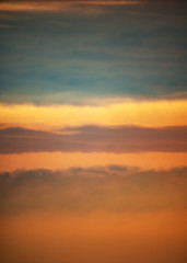 Fantastic clouds at sunrise, vertical panorama
