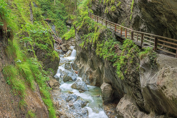 A wooden footbridge gives entrance to the Kitzlochklamm, a deep gorge near Zell am See