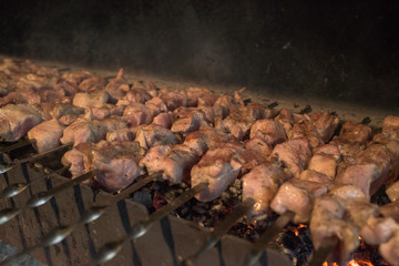 The process of preparing a delicious barbecue on a large grill