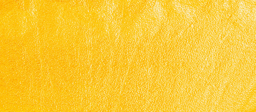 Golden metallic background. Crumpled texture foil