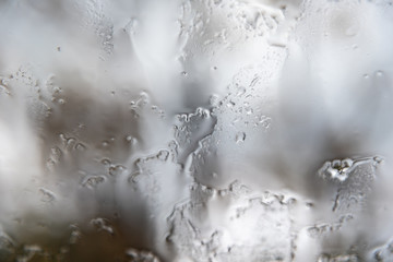 Rain drops on window close up.