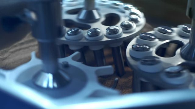 Electronic automatic medical blood separation test centrifuge in chemical laboratory. Closeup shot of clinical examination process.