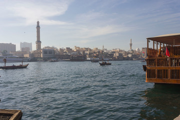 DUBAI, UAE - DECEMBER 26 2017: Dubai Creek withtraditional boats navigating