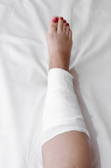 large bandage on leg after operation