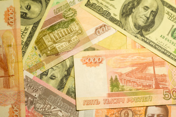 A lots of a money of different countries: USA, Russia, Thailand and Cambodia. Flat lay background with copyspace for a text.