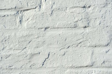 weiß gestrichene alte Steinwand