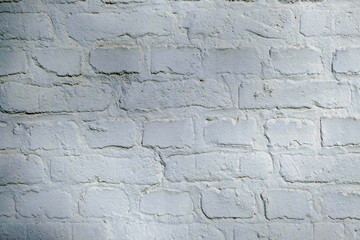 weiß gestrichene alte Steinwand