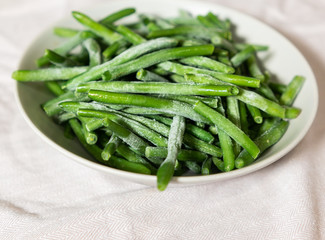 Frozen green beans in a plate