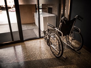 The Wheelchair is parked in the hospital building.
