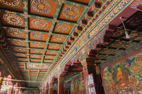 Interior of famous Buddhist Temple Jokhang in Lhasa with paintings, Tibet