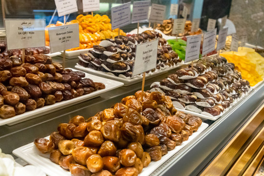 Eastern desserts displayed on sweets shelves for sale