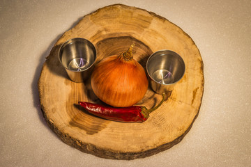 Fototapeta premium in the photo, onion, red pepper and pepper tincture.