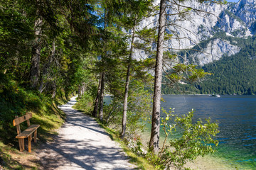 Tourist hiking trail along Lake Altaussee in Austria
