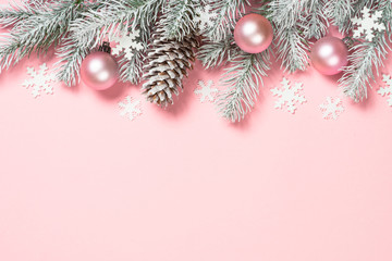 Fototapeta na wymiar Christmas flat lay background with christmas present box on pink.