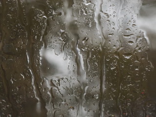 Raindrops on the glass.