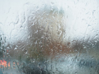 Raindrops on the glass.