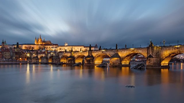 Day to night transition long exposure time lapse of Prague old town and Charles Bridge, Czech Republic