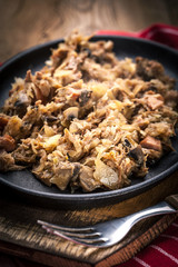 Traditional polish sauerkraut (bigos) with mushrooms and meat.