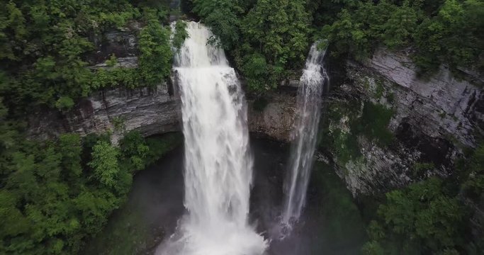 Aerial footage of a waterfall in Fall Creek Falls state park in Tennessee. The waterfall is a large tourist attraction in Tenessee.