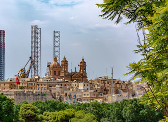 View to the Basilica of the Nativity of Mary in Senglea from Bormla garden. The church was...