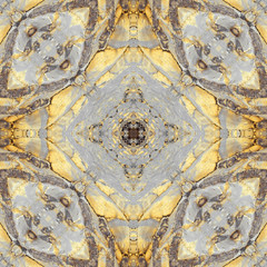 Geometric ornament made of layered limestone, filled by yellow. The multiaxial self-reflected...