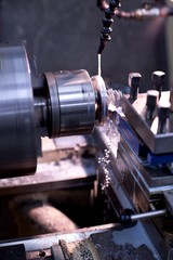 Old metal lathe machine, retro machine background.