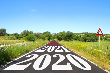 Road with written 2020, 2021, 2022