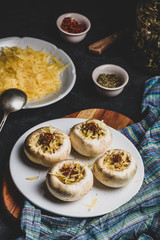 Button mushrooms stuffed with cheese and spices