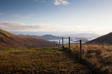 Fototapeta na wymiar Climbing, to the top of a Scottish mountain in winter
