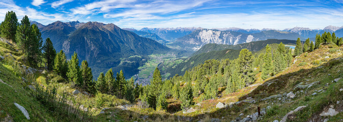 Fototapeta na wymiar Mountain river and trees landscape. Kaunertaler Gletscher natural environment. Hiking in the alps, Kaunertal, Tirol, Austria, Europe.
