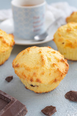 Rice muffins with chocolate. Delicious homemade cupcakes with a cup of coffee.