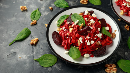 Roast Beetroot Pasta with spinach, walnuts and feta cheese. healthy food
