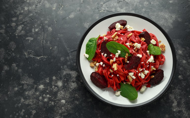 Roast Beetroot Pasta with spinach, walnuts and feta cheese. healthy food