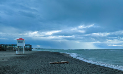 Lifeguard tower on the beach in a storm