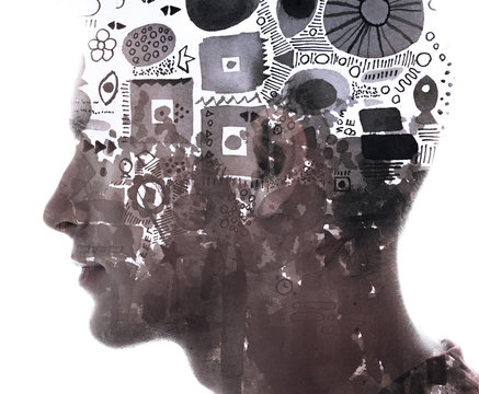 Paintography. Double exposure of an attractive male model combined with hand drawn paintings with symbols and geometry