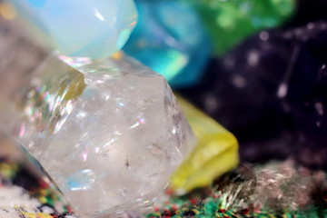 Rhinestone crystal on quartz and amethyst background