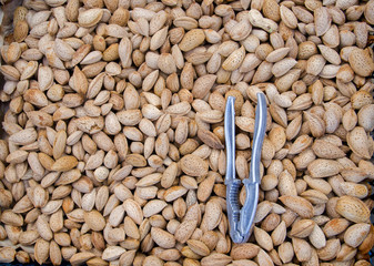 Raw almonds in shell as a background