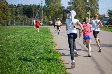 Children compete in running. Jogging in the morning.