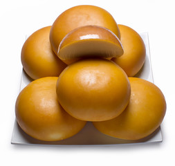 plate with cheese on a white background