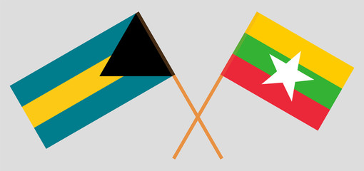 Crossed flags of Myanmar and Bahamas