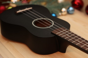 Fototapeta premium black ukulele close up 