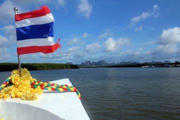 Fototapeta na wymiar Thai National Flag on Boat