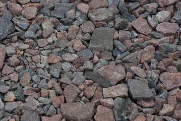 brown gray stone background of fine  rubble in a heap