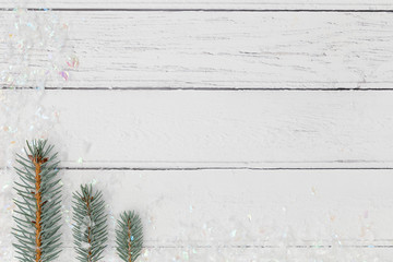Fototapeta premium Christmas decorations on white wooden background space for text