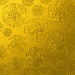 luxury gold foil texture with floral stamps design for rich elegant surface designs, backgrounds and backdrops